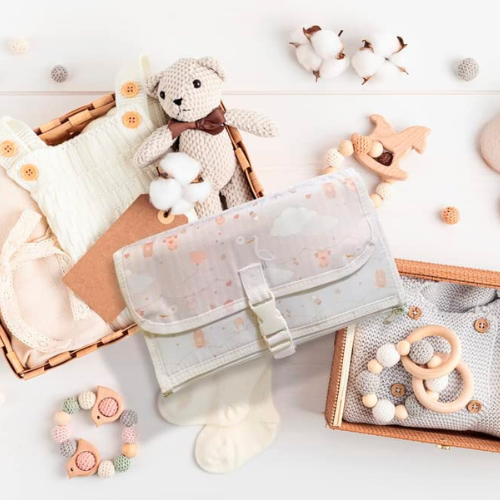 cambiador de bebé plegable con compartimentos