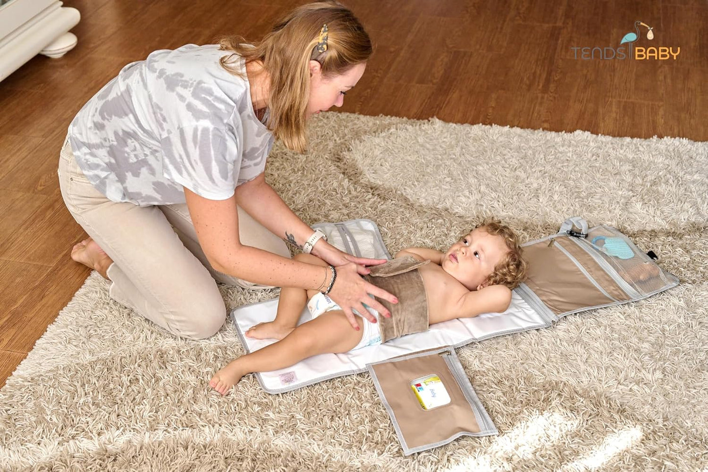 cambiador portátil con cinturón para bebé