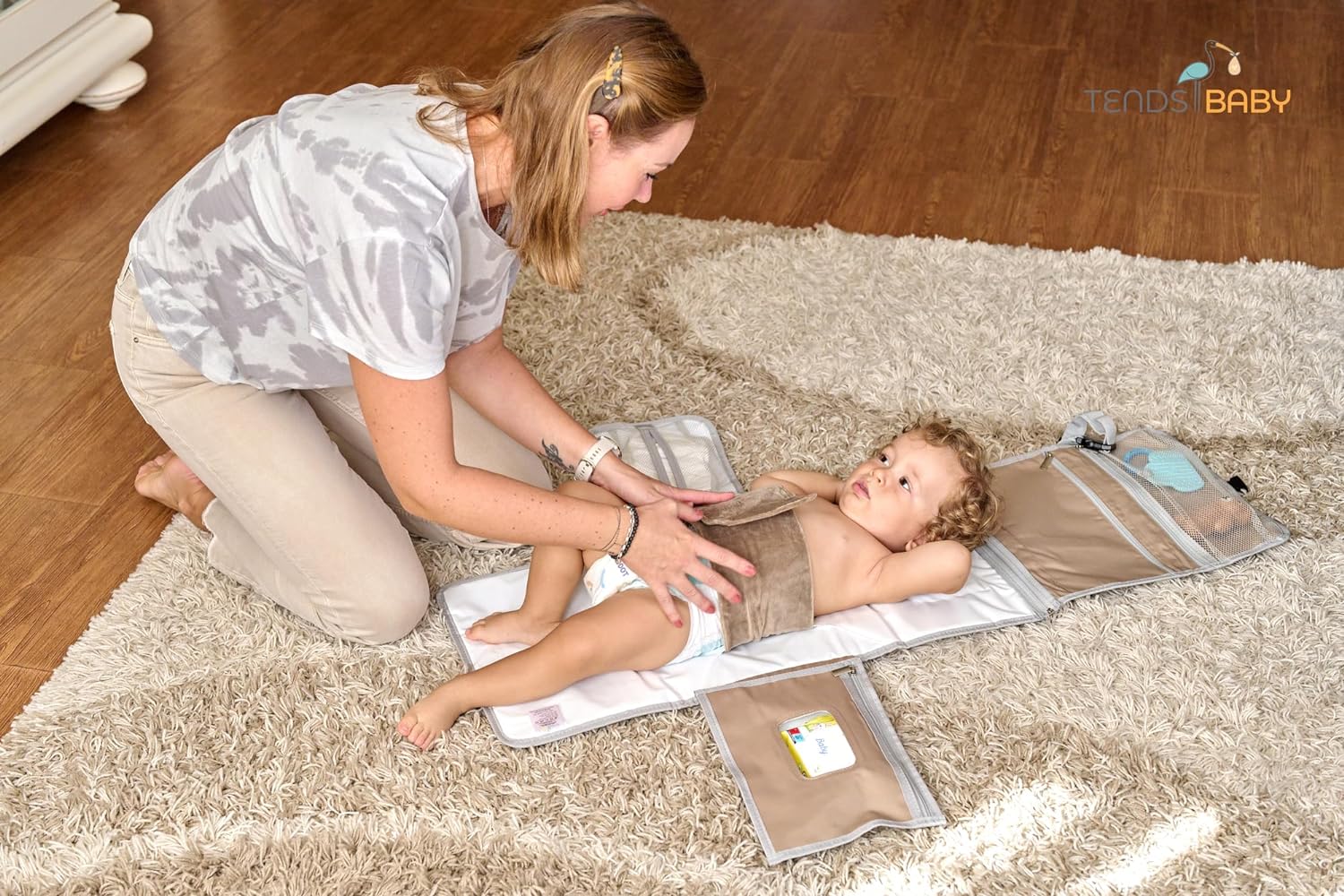 cambiador portátil con cinturón para bebé