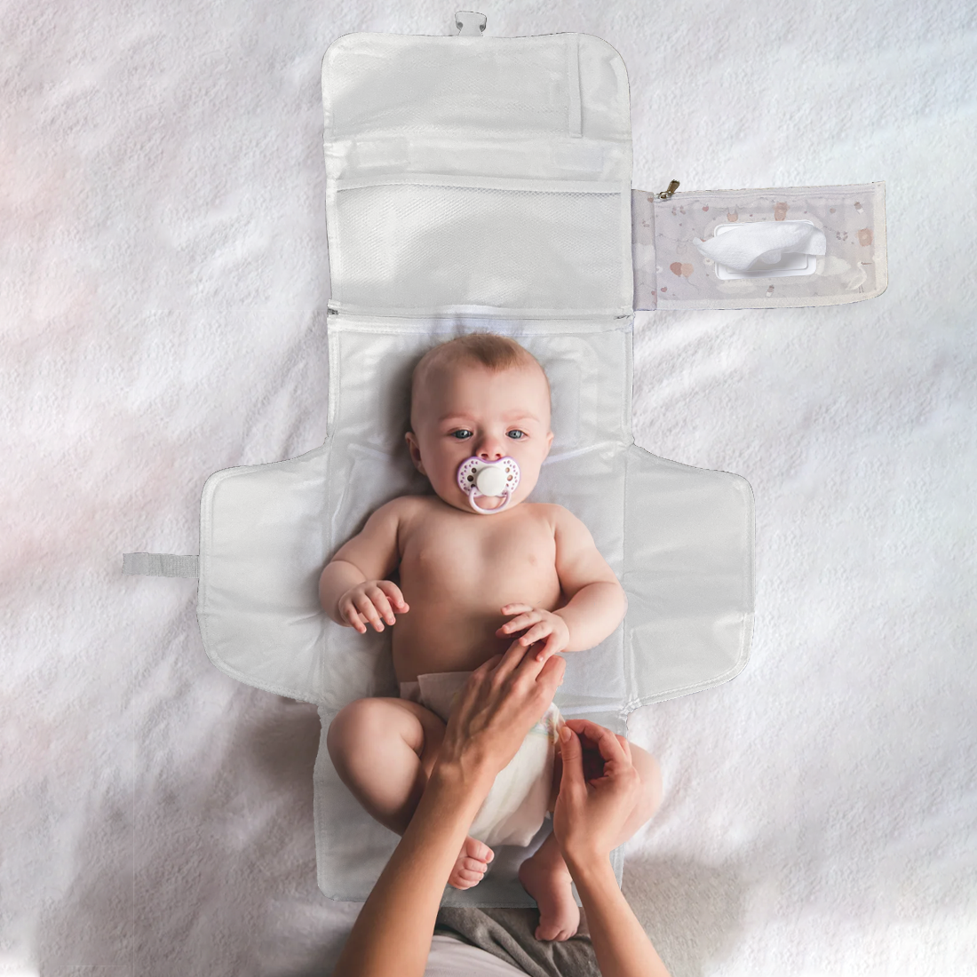 cambiador portátil para bebé con compartimentos